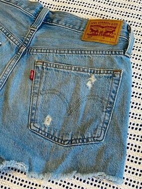 Levi’s 501 light-wash denim cutoff shorts distressed button fly Size 27